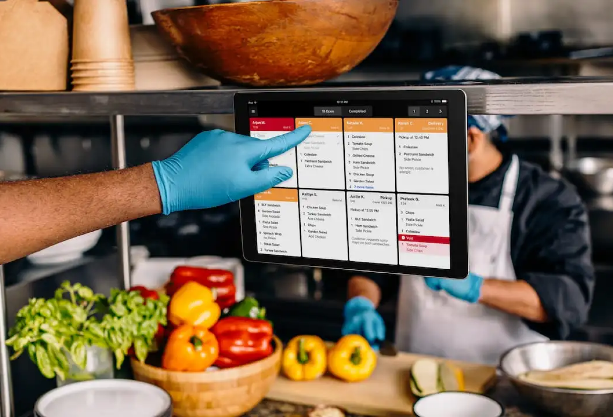 Customer using iPhone to scan QR code on table for restaurant menu.